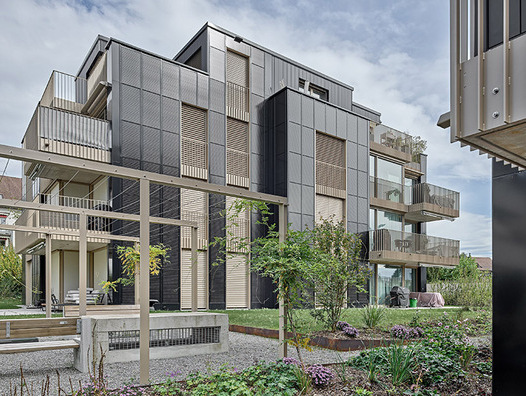 Der Aussenraum der neuen Mehrfamilienhäuser in Bassersdorf umfasst auch Gemeinschaftsräume. | © Umwelt Arena Schweiz